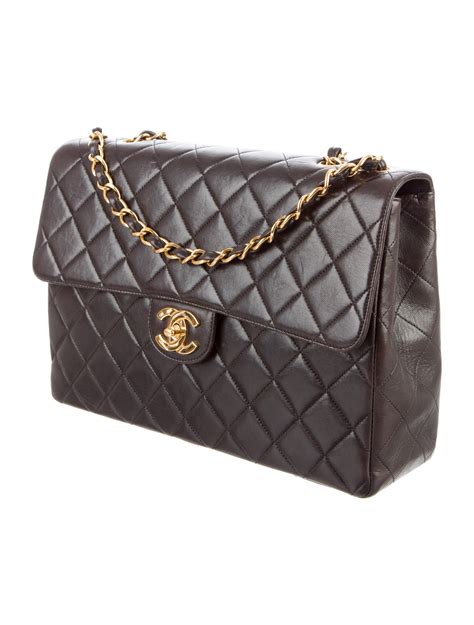 chanel black classic jumbo single flap bag|More.